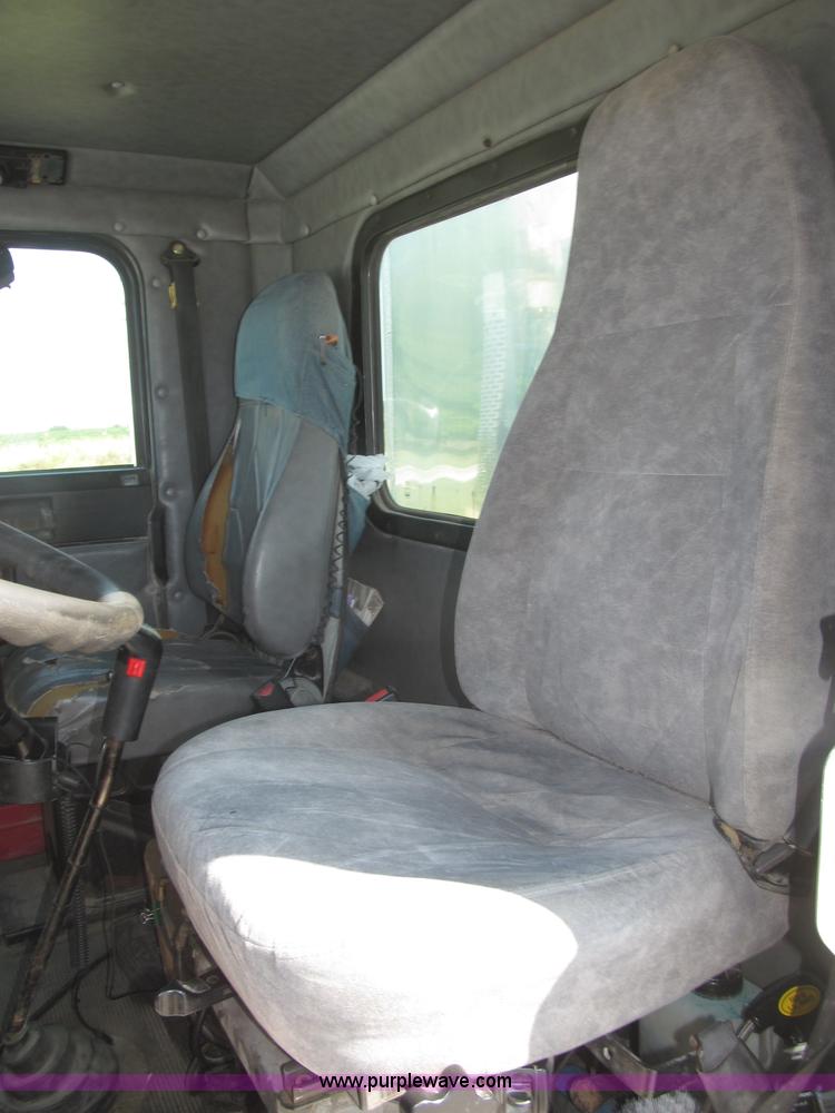 image for item F7115 2001 Freightliner FLD120 tri axle dump truck