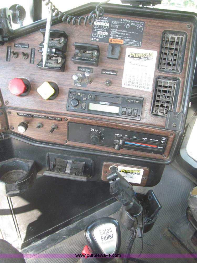 image for item F7115 2001 Freightliner FLD120 tri axle dump truck