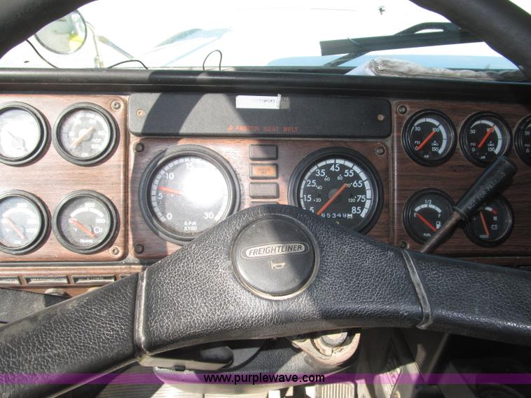 image for item F7115 2001 Freightliner FLD120 tri axle dump truck