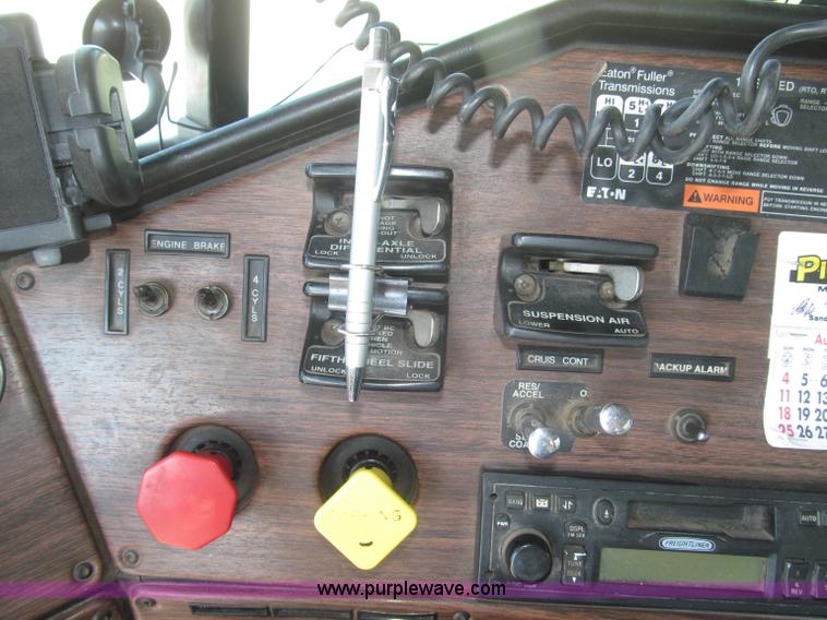 image for item F7115 2001 Freightliner FLD120 tri axle dump truck