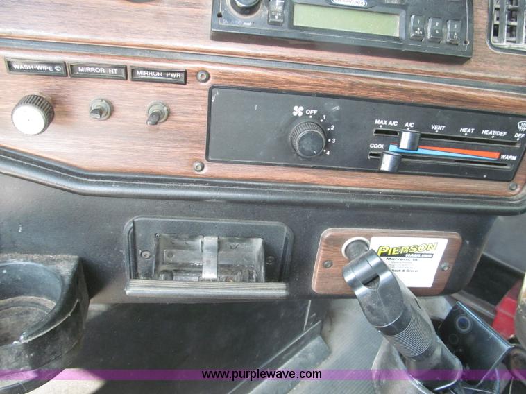 image for item F7115 2001 Freightliner FLD120 tri axle dump truck