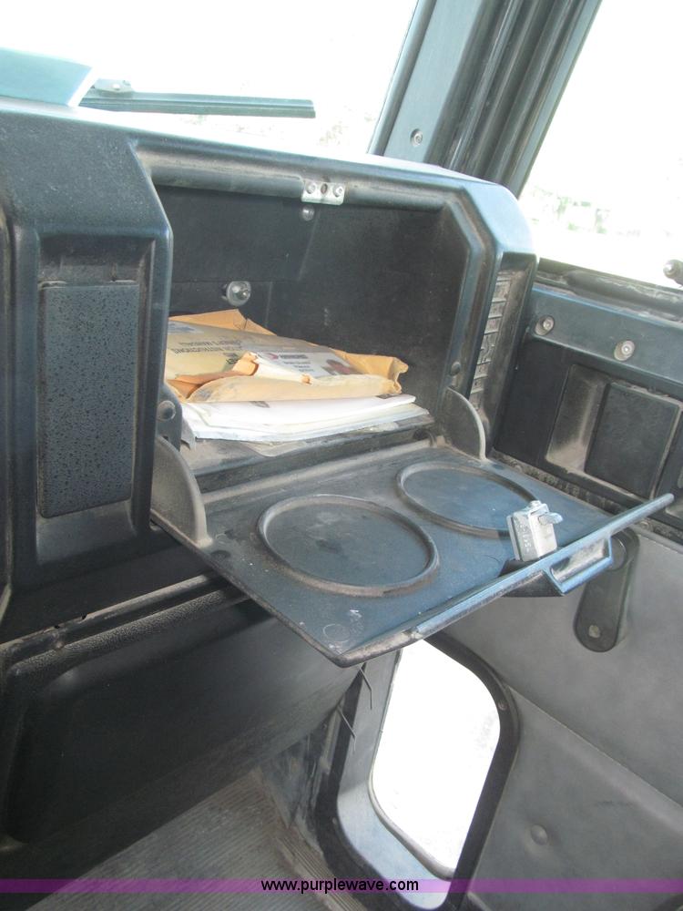 image for item F7115 2001 Freightliner FLD120 tri axle dump truck