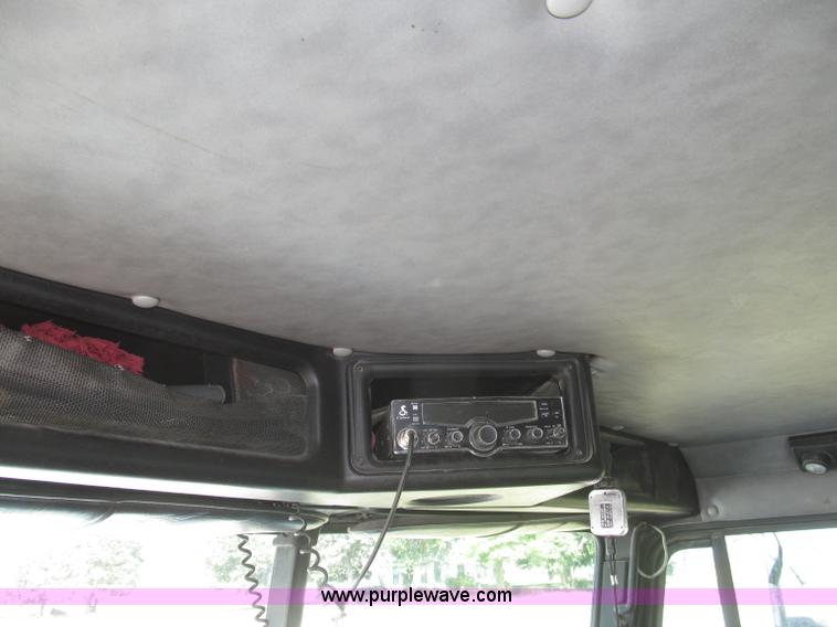 image for item F7115 2001 Freightliner FLD120 tri axle dump truck