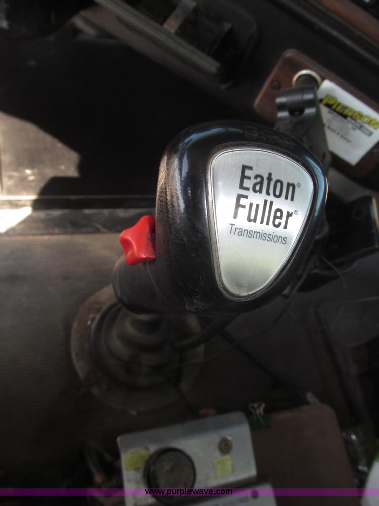 image for item F7115 2001 Freightliner FLD120 tri axle dump truck