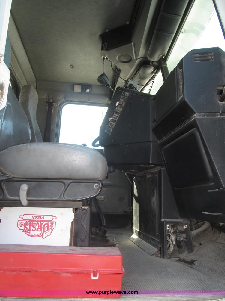 image for item F7115 2001 Freightliner FLD120 tri axle dump truck