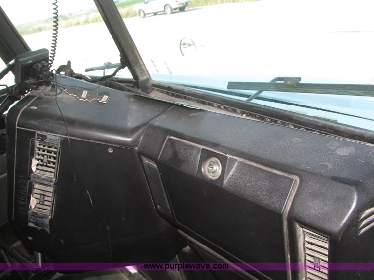 image for item F7115 2001 Freightliner FLD120 tri axle dump truck