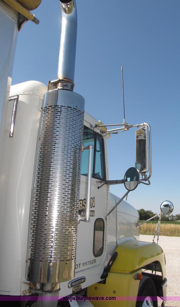 image for item F7115 2001 Freightliner FLD120 tri axle dump truck