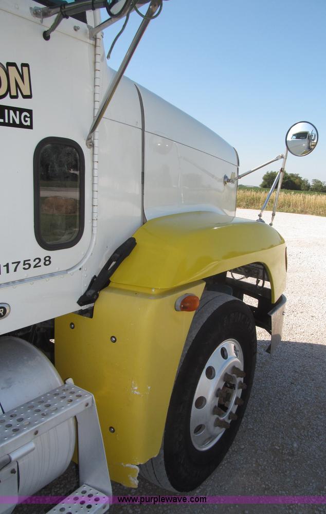 image for item F7115 2001 Freightliner FLD120 tri axle dump truck