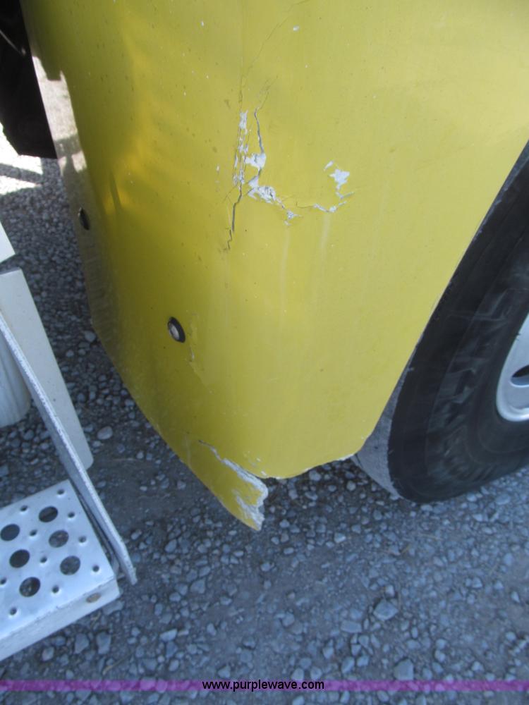 image for item F7115 2001 Freightliner FLD120 tri axle dump truck