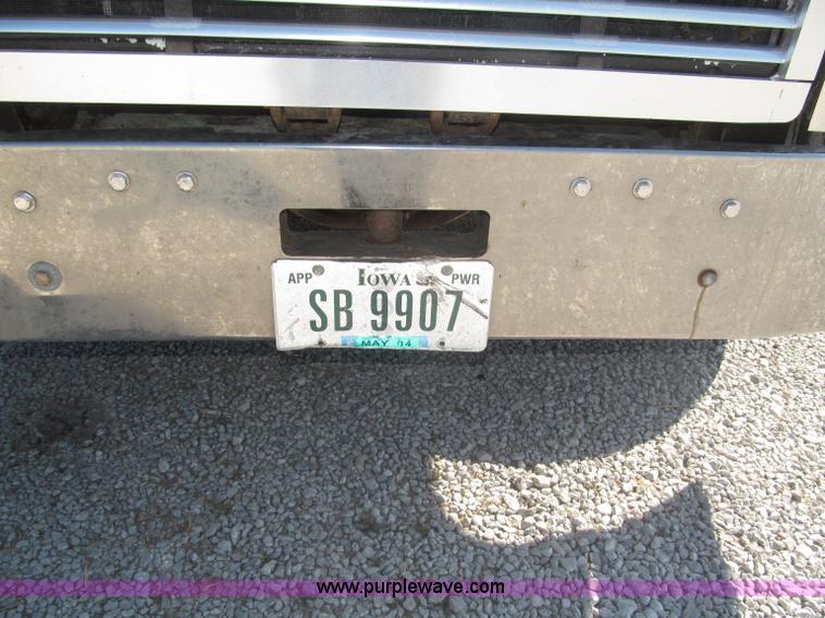 image for item F7115 2001 Freightliner FLD120 tri axle dump truck