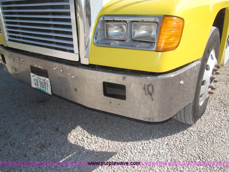 image for item F7115 2001 Freightliner FLD120 tri axle dump truck