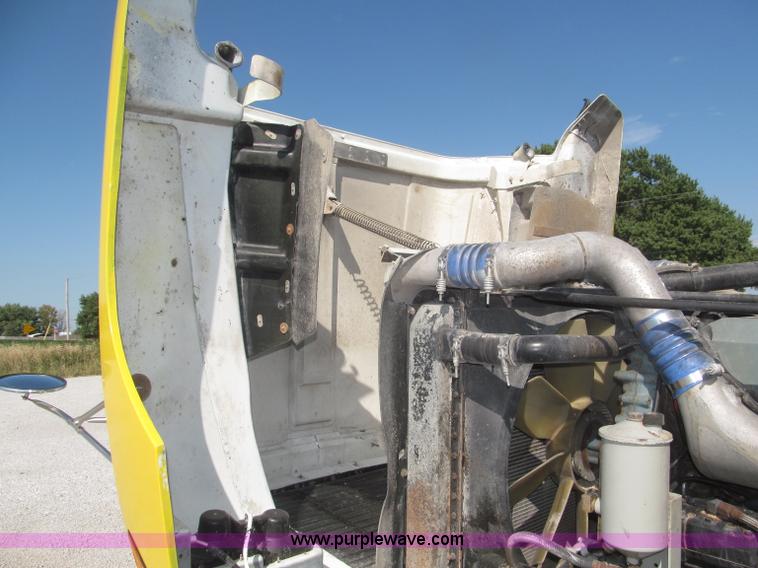 image for item F7115 2001 Freightliner FLD120 tri axle dump truck