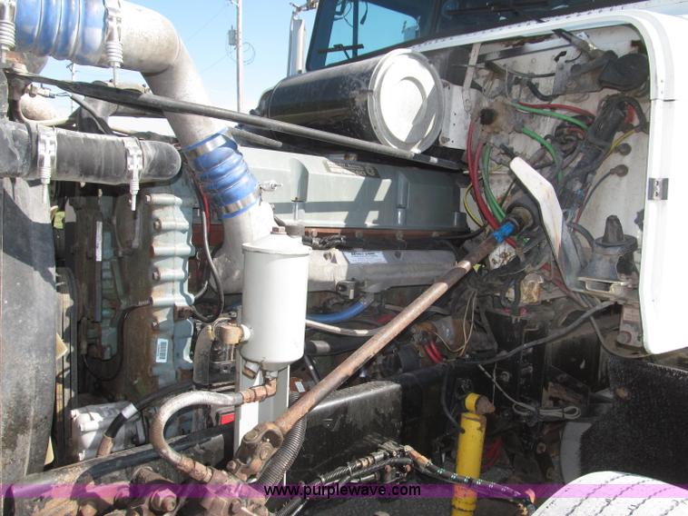 image for item F7115 2001 Freightliner FLD120 tri axle dump truck