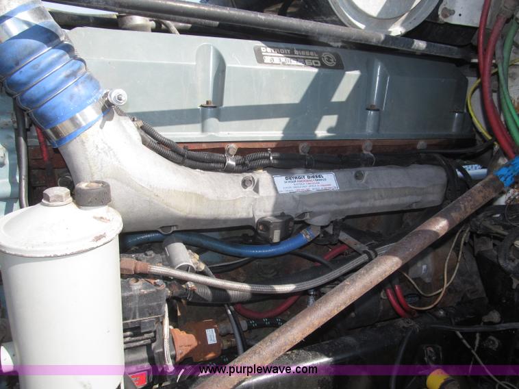 image for item F7115 2001 Freightliner FLD120 tri axle dump truck