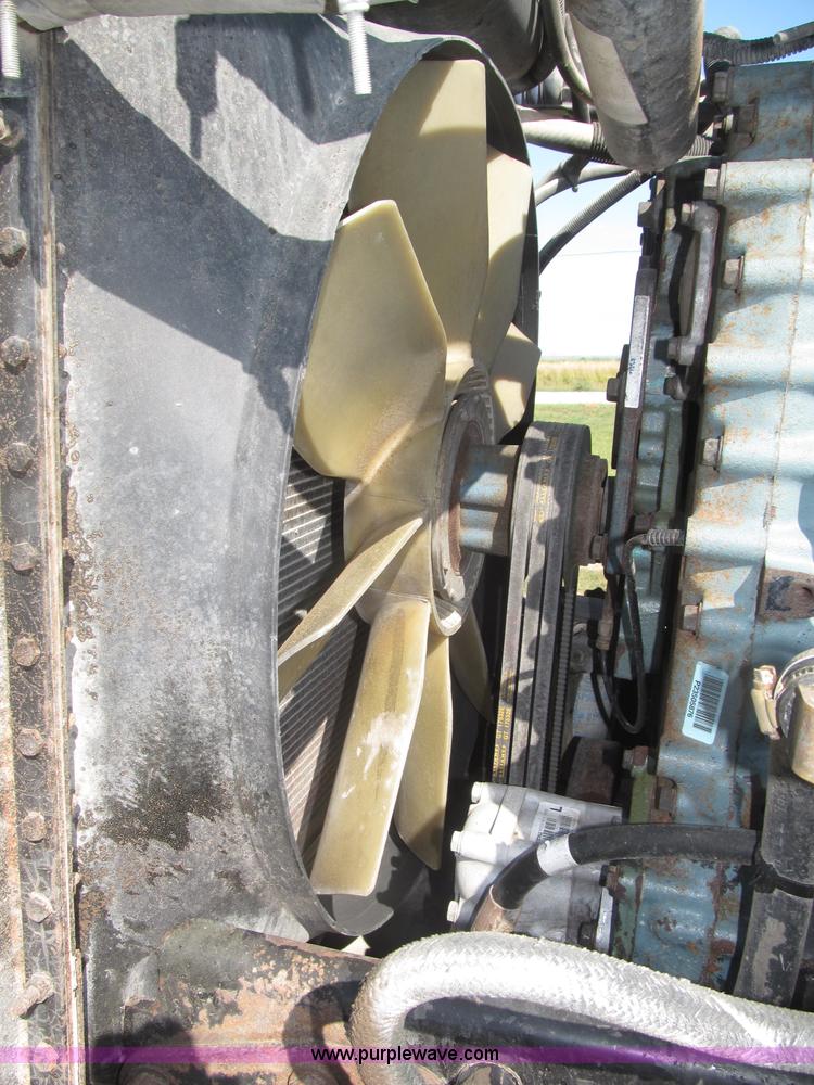 image for item F7115 2001 Freightliner FLD120 tri axle dump truck