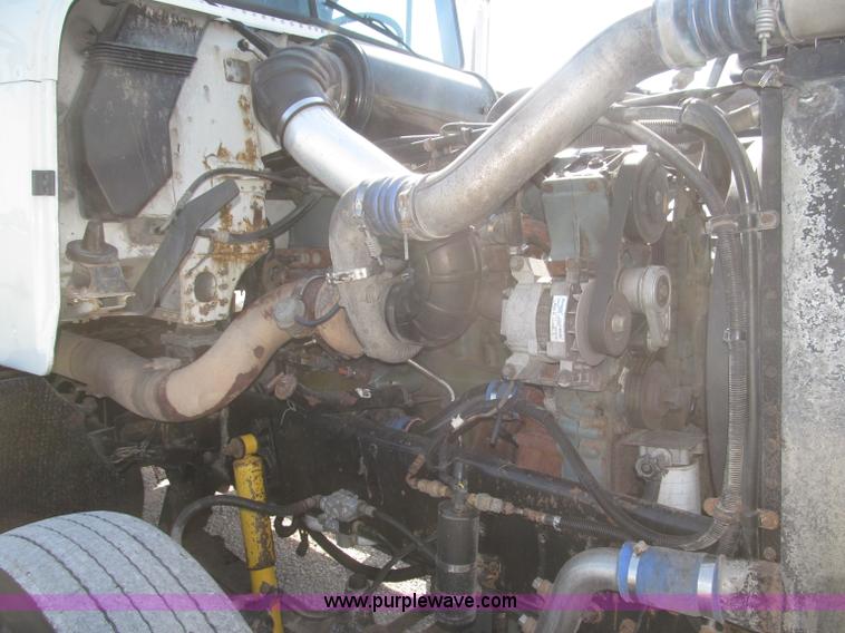 image for item F7115 2001 Freightliner FLD120 tri axle dump truck