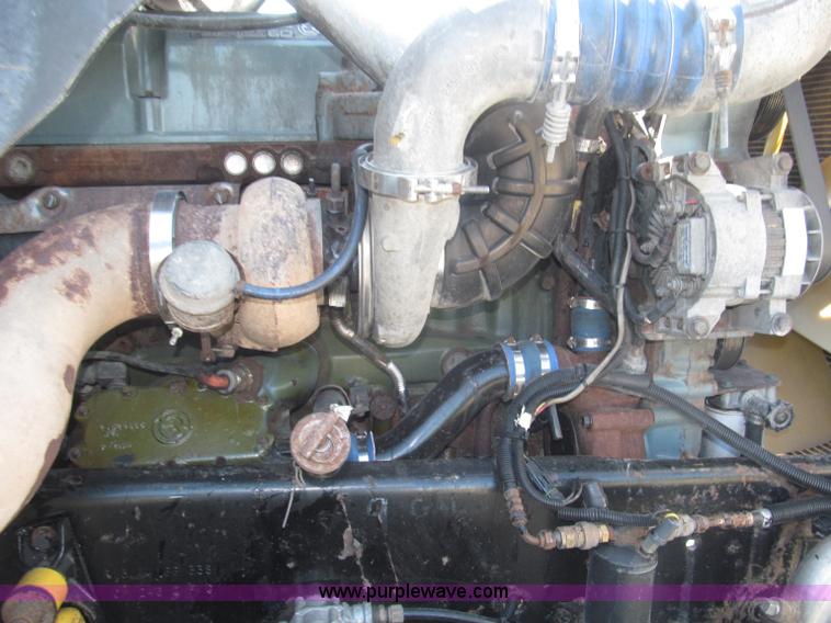 image for item F7115 2001 Freightliner FLD120 tri axle dump truck