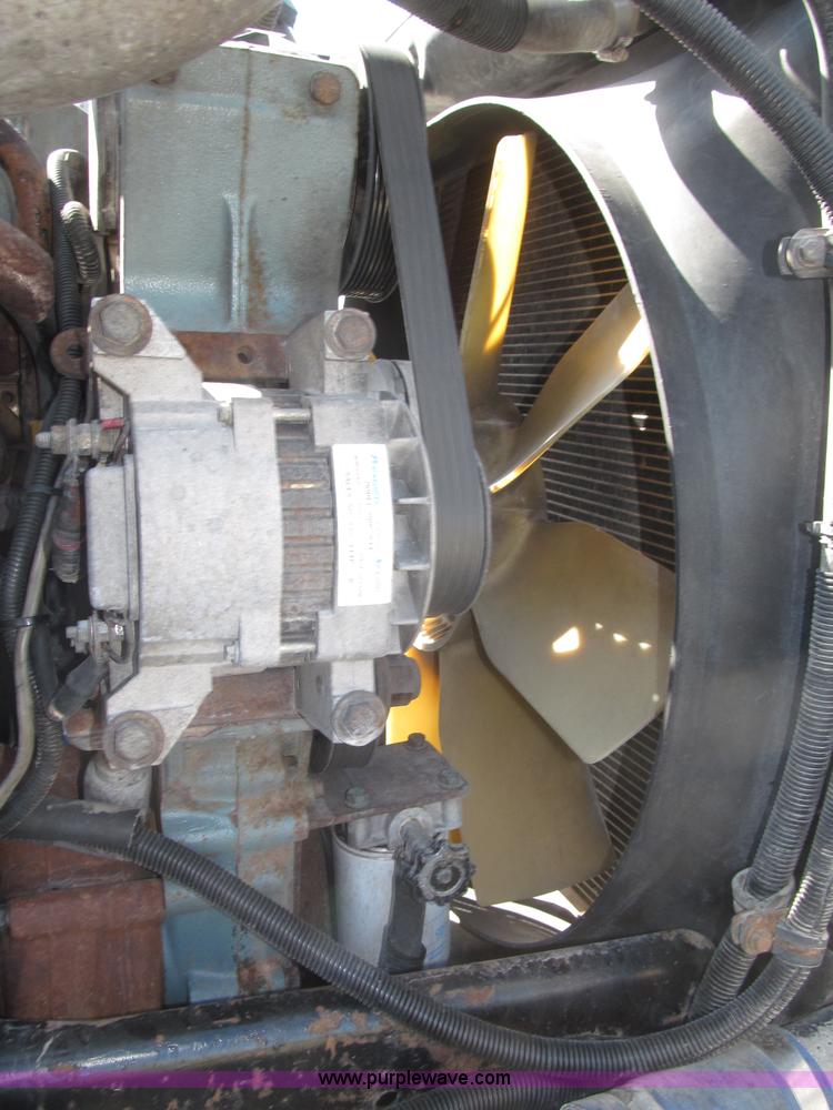 image for item F7115 2001 Freightliner FLD120 tri axle dump truck