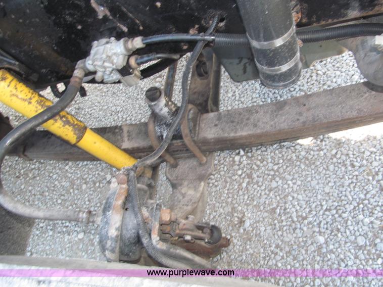 image for item F7115 2001 Freightliner FLD120 tri axle dump truck