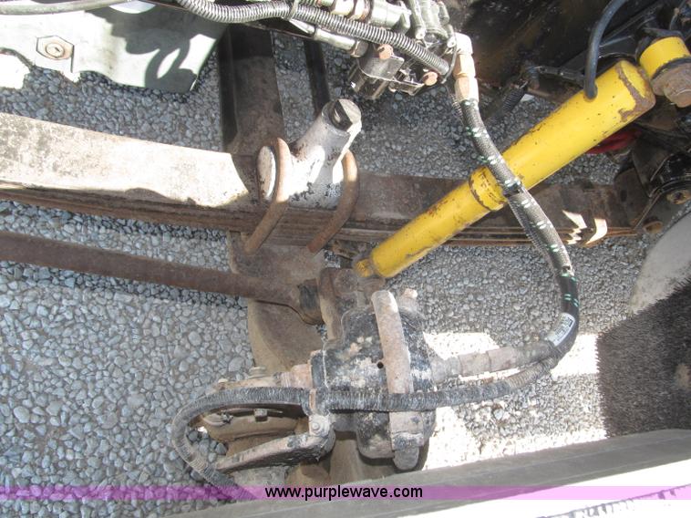 image for item F7115 2001 Freightliner FLD120 tri axle dump truck