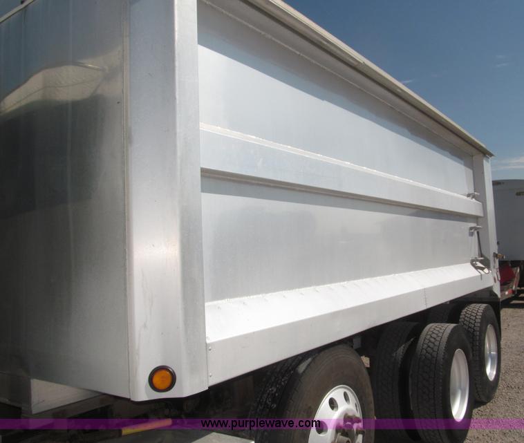 image for item F7115 2001 Freightliner FLD120 tri axle dump truck