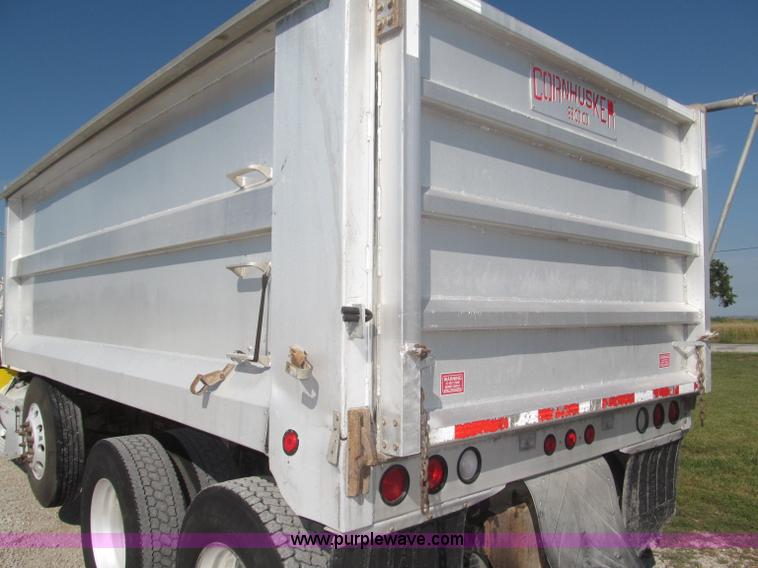 image for item F7115 2001 Freightliner FLD120 tri axle dump truck