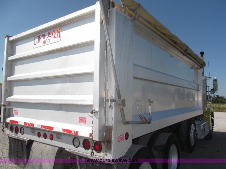 image for item F7115 2001 Freightliner FLD120 tri axle dump truck