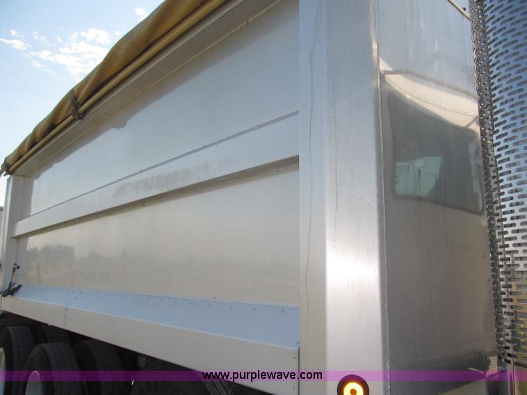 image for item F7115 2001 Freightliner FLD120 tri axle dump truck