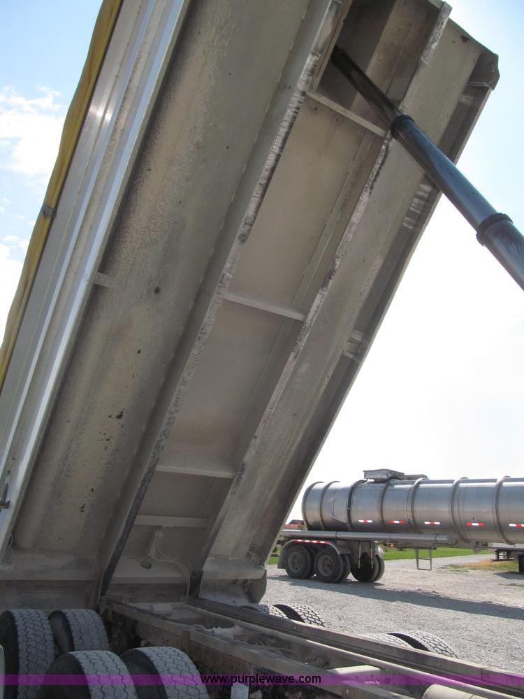 image for item F7115 2001 Freightliner FLD120 tri axle dump truck