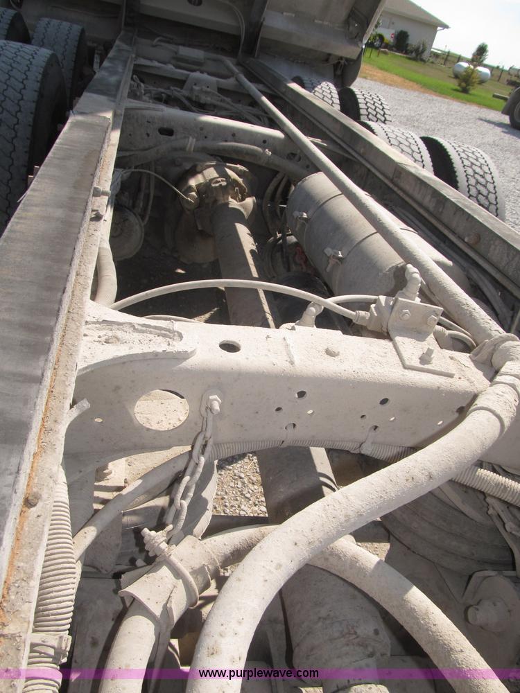 image for item F7115 2001 Freightliner FLD120 tri axle dump truck