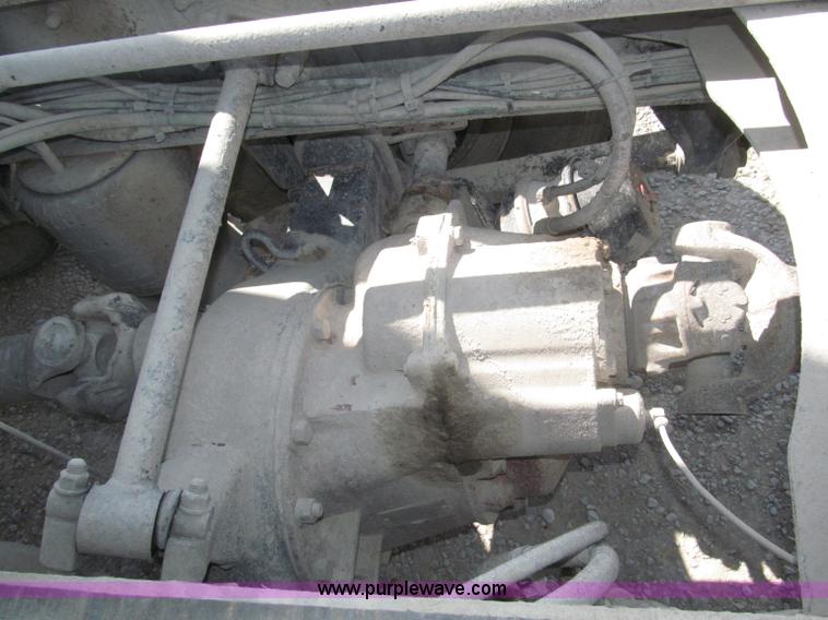 image for item F7115 2001 Freightliner FLD120 tri axle dump truck