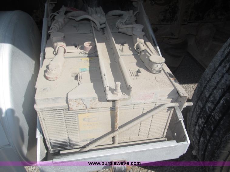 image for item F7115 2001 Freightliner FLD120 tri axle dump truck