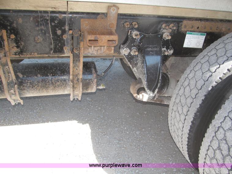 image for item F7115 2001 Freightliner FLD120 tri axle dump truck