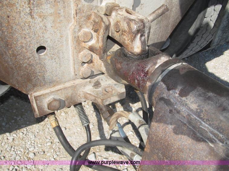 image for item F7115 2001 Freightliner FLD120 tri axle dump truck