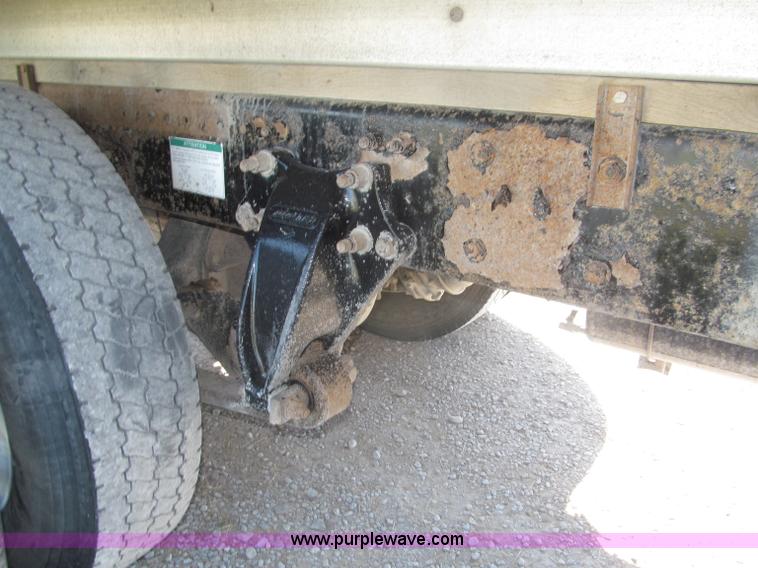 image for item F7115 2001 Freightliner FLD120 tri axle dump truck