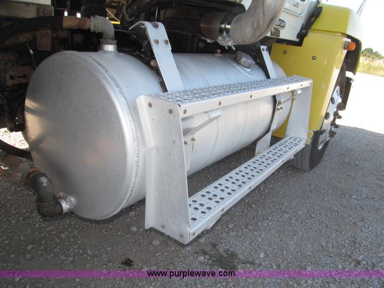 image for item F7115 2001 Freightliner FLD120 tri axle dump truck