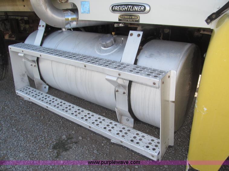 image for item F7115 2001 Freightliner FLD120 tri axle dump truck