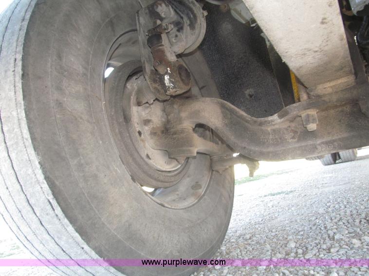 image for item F7115 2001 Freightliner FLD120 tri axle dump truck