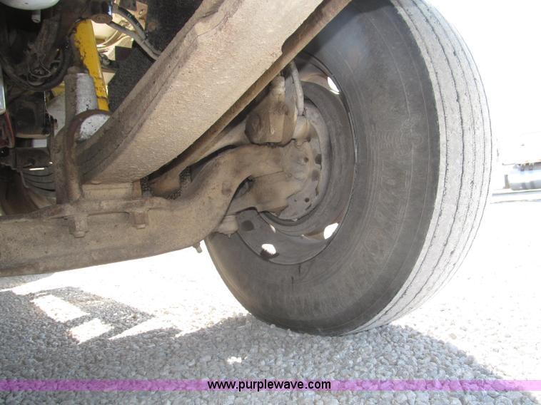 image for item F7115 2001 Freightliner FLD120 tri axle dump truck