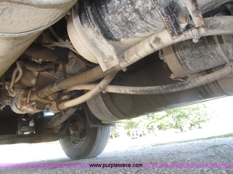 image for item F7115 2001 Freightliner FLD120 tri axle dump truck