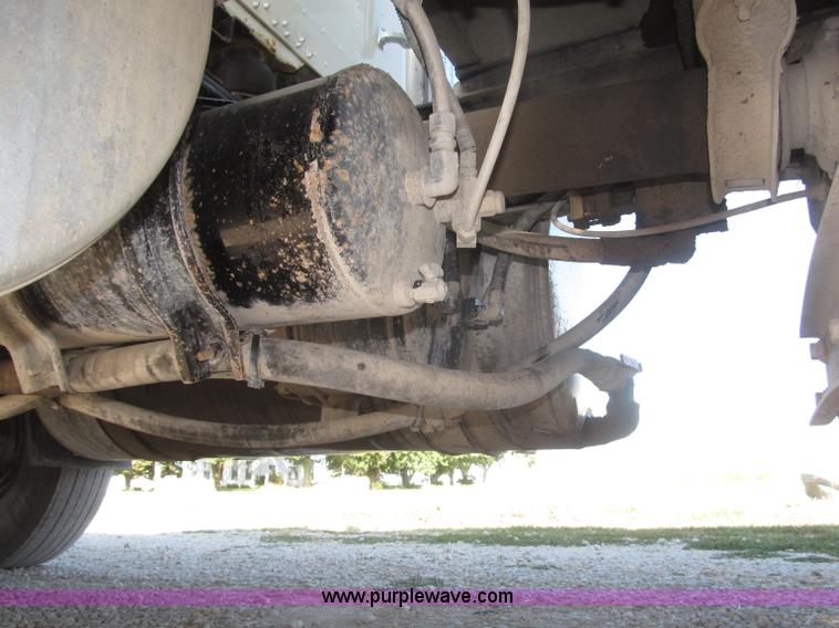 image for item F7115 2001 Freightliner FLD120 tri axle dump truck