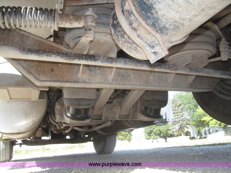 image for item F7115 2001 Freightliner FLD120 tri axle dump truck