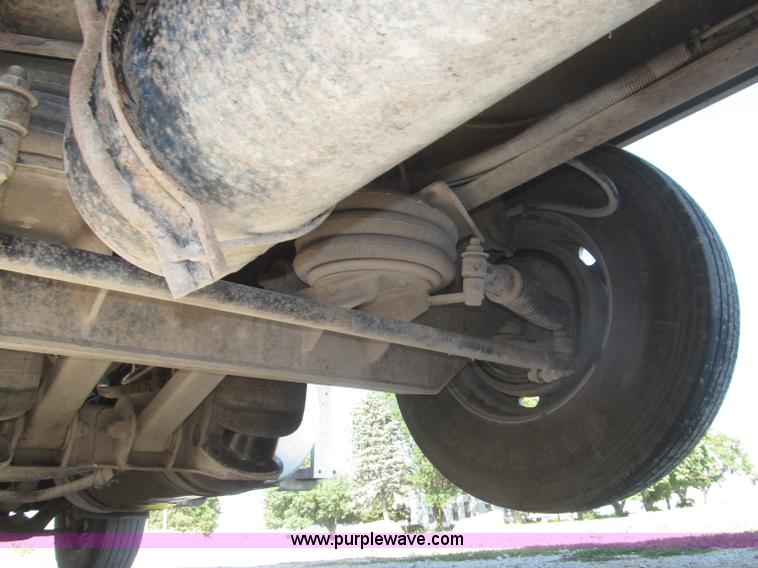 image for item F7115 2001 Freightliner FLD120 tri axle dump truck