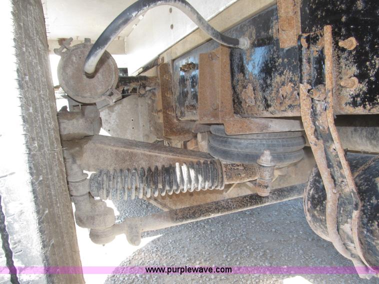 image for item F7115 2001 Freightliner FLD120 tri axle dump truck