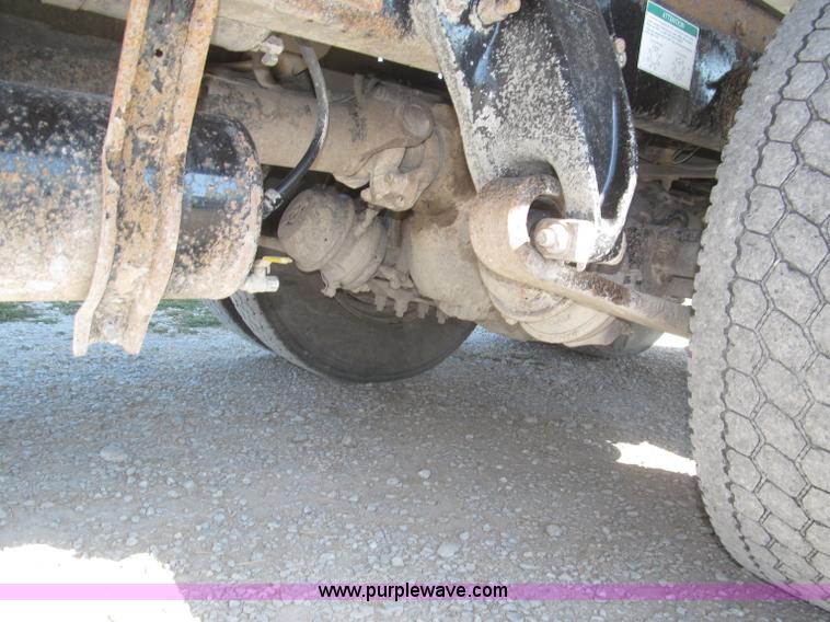 image for item F7115 2001 Freightliner FLD120 tri axle dump truck