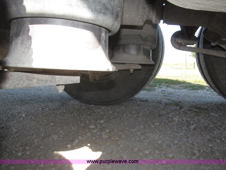 image for item F7115 2001 Freightliner FLD120 tri axle dump truck