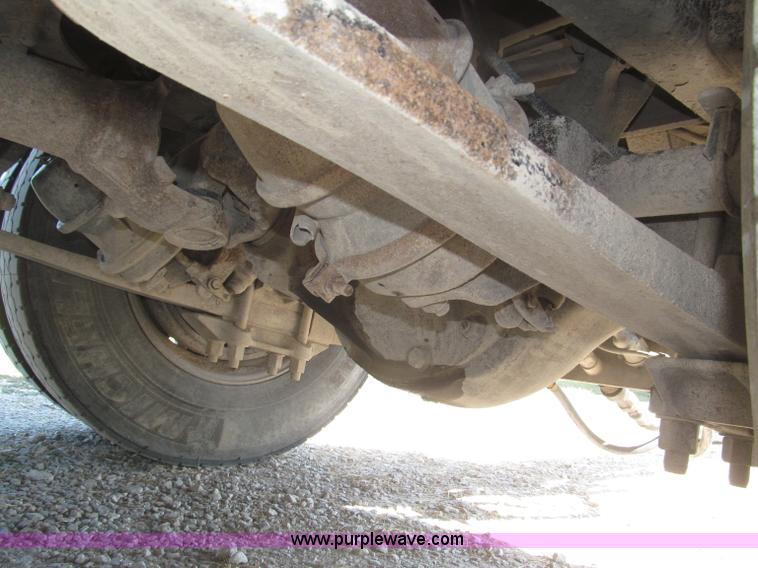 image for item F7115 2001 Freightliner FLD120 tri axle dump truck