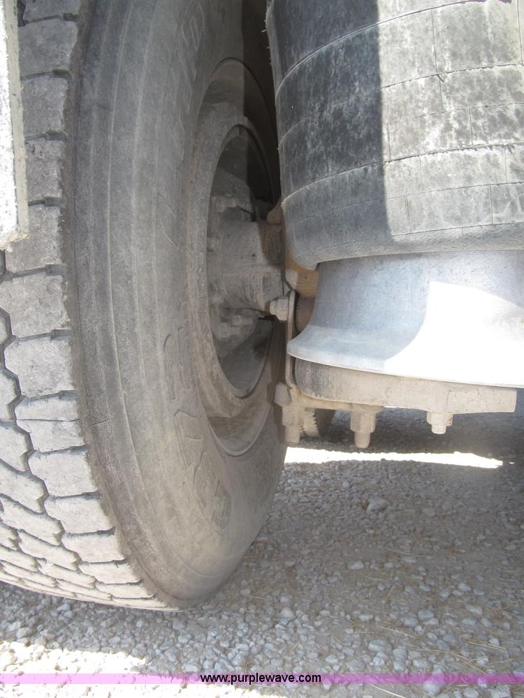 image for item F7115 2001 Freightliner FLD120 tri axle dump truck