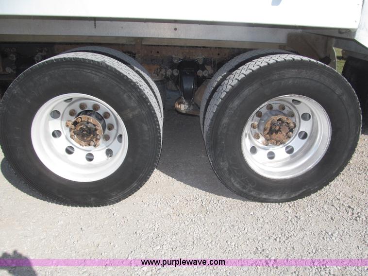 image for item F7115 2001 Freightliner FLD120 tri axle dump truck