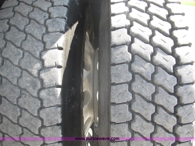 image for item F7115 2001 Freightliner FLD120 tri axle dump truck